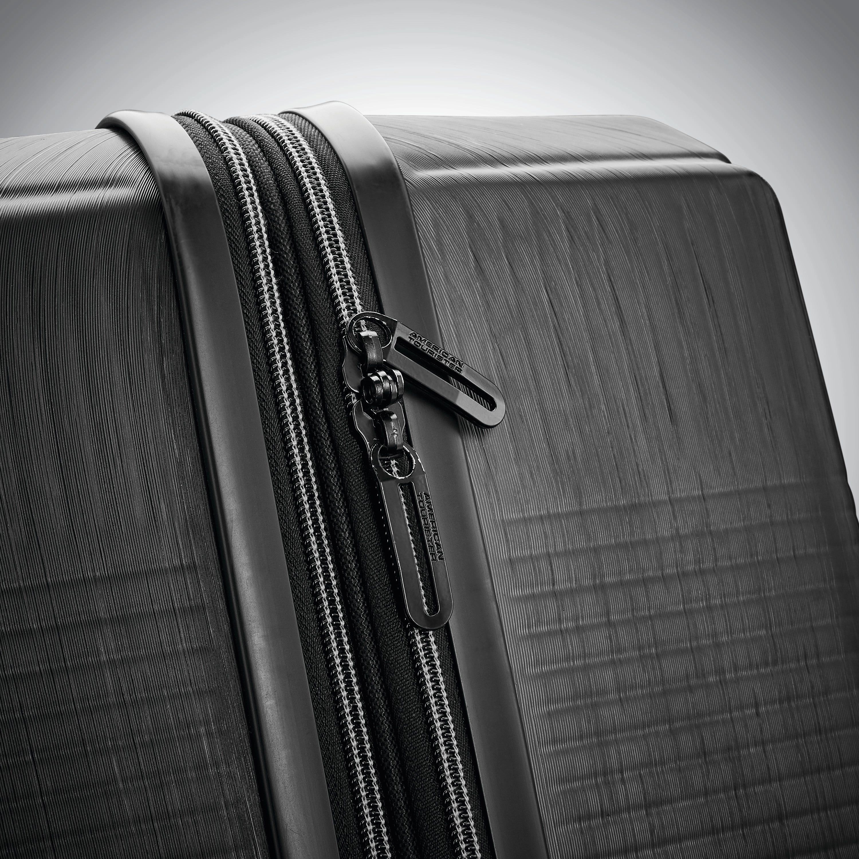 American Tourister Stratum XLT 20" 4-Wheel Carry-On Luggage
