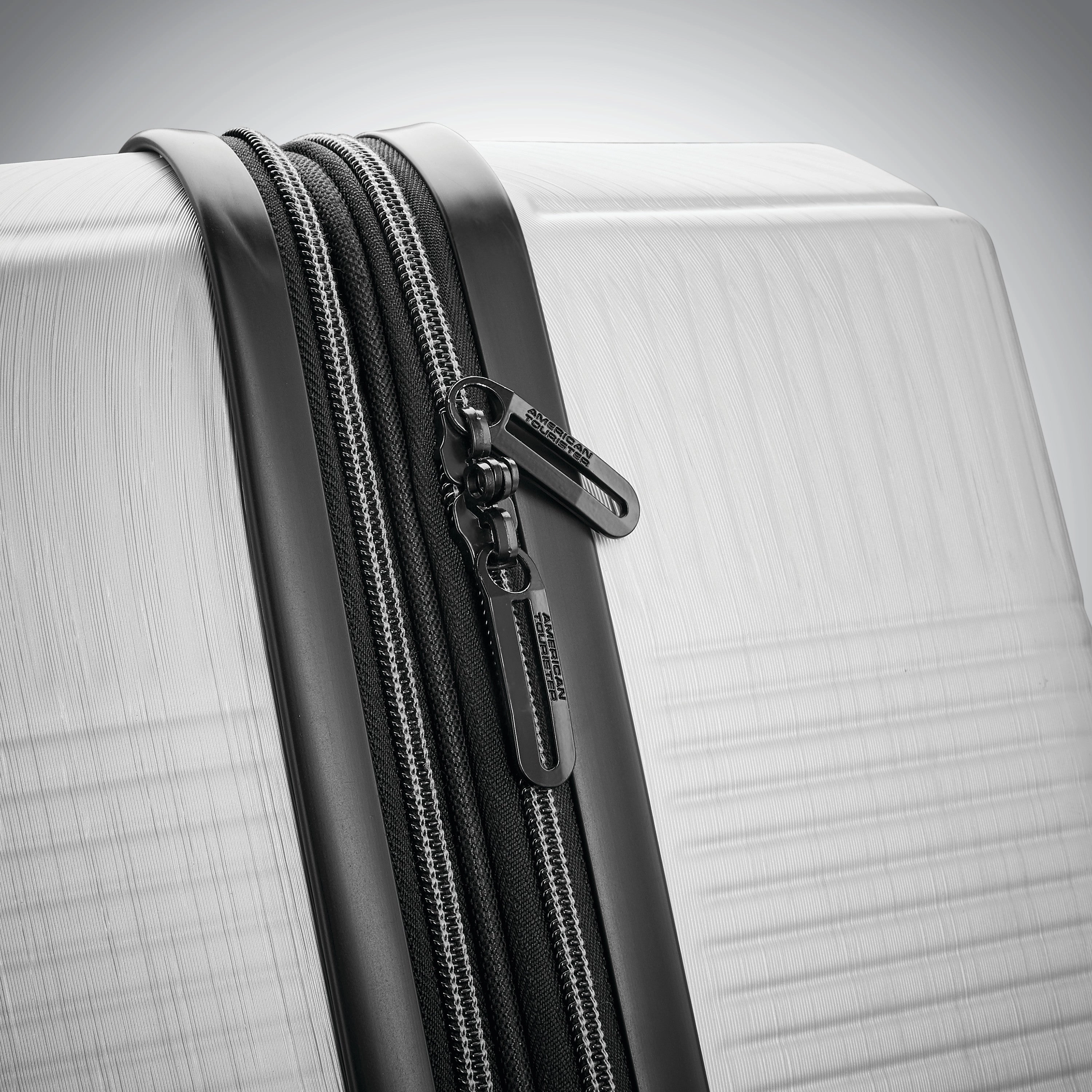 American Tourister Stratum XLT 20" 4-Wheel Carry-On Luggage