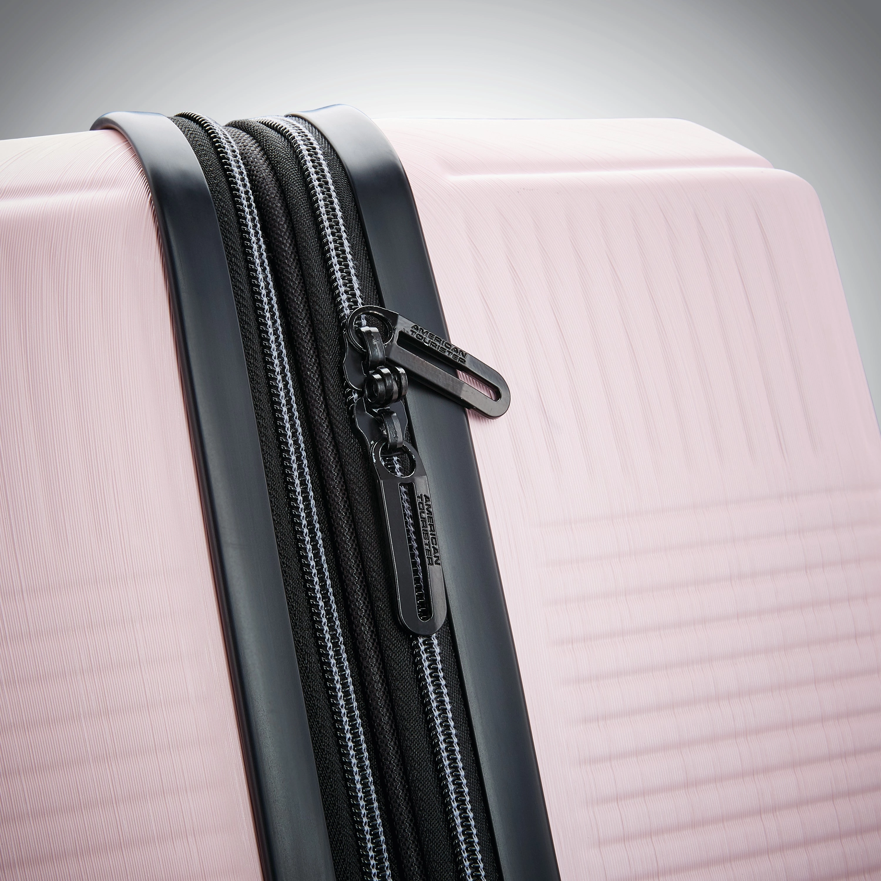 American Tourister Stratum XLT 20" 4-Wheel Carry-On Luggage
