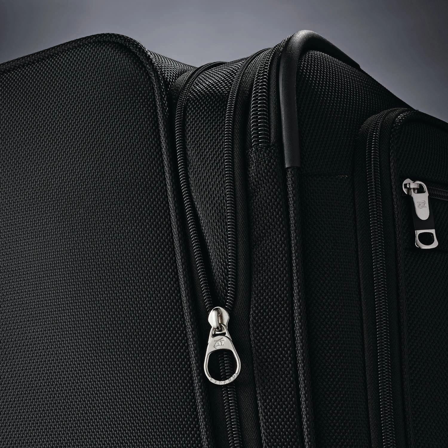 American Tourister Triumph DLX 21" 4-Wheel Carry-On Luggage