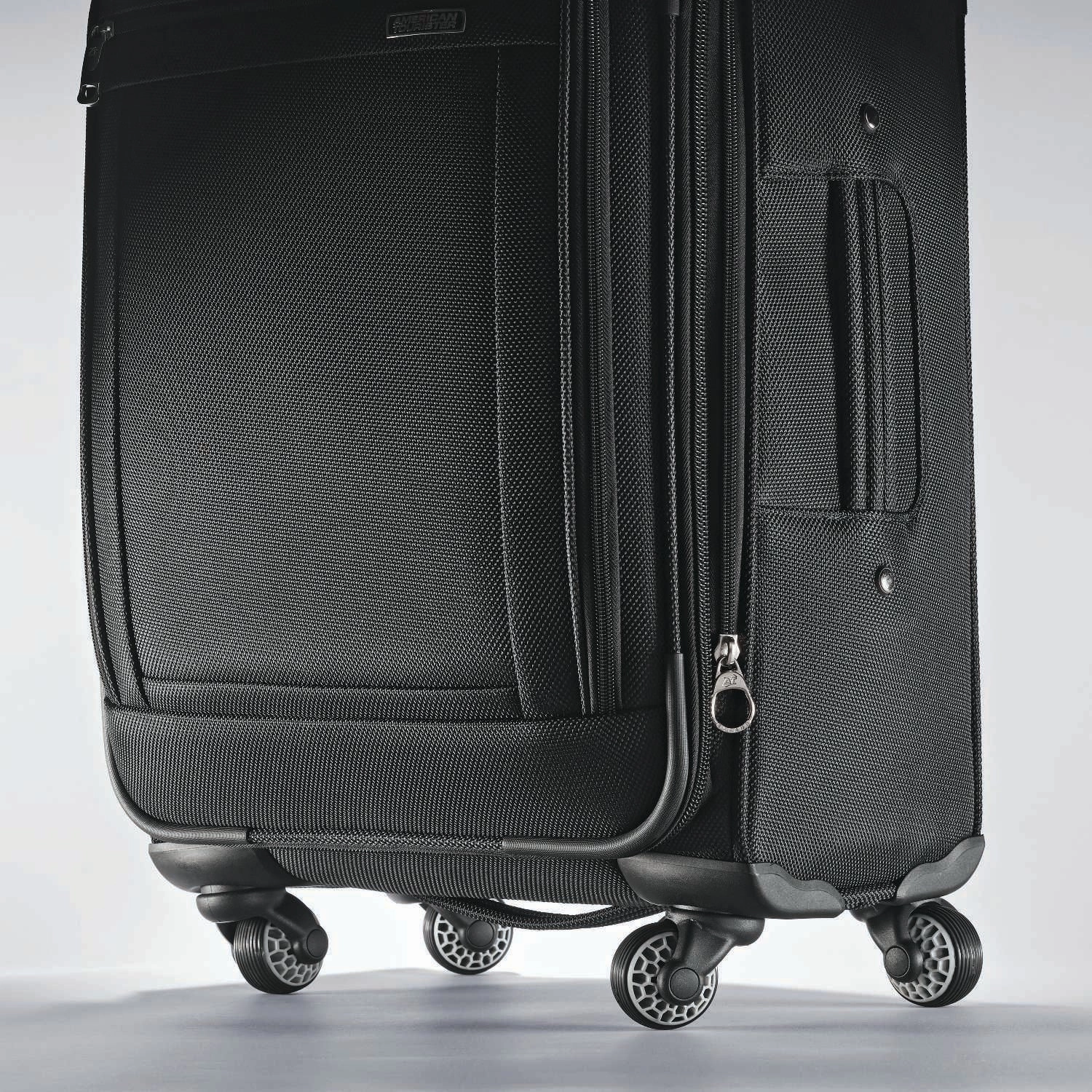 American Tourister Triumph DLX 21" 4-Wheel Carry-On Luggage