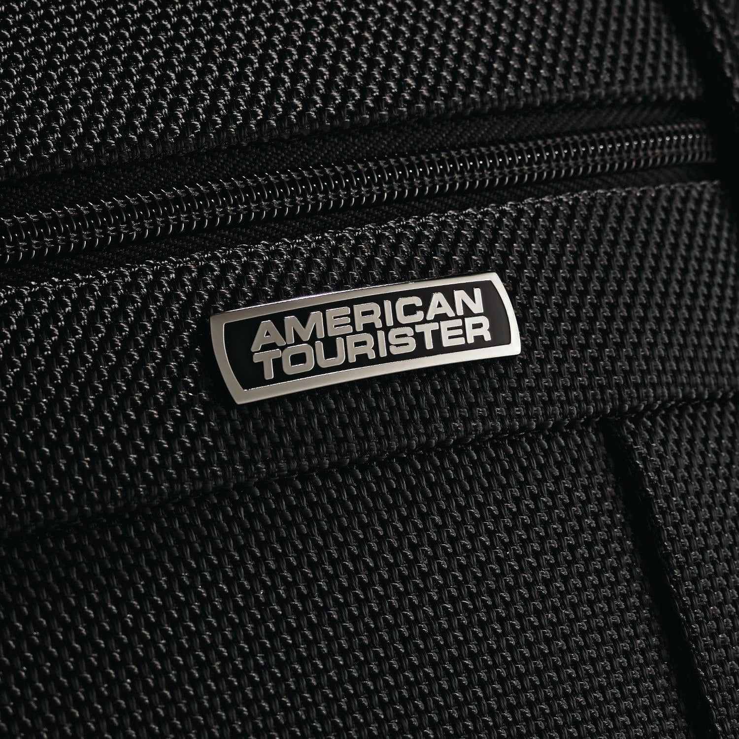 American Tourister Triumph DLX 21" 4-Wheel Carry-On Luggage