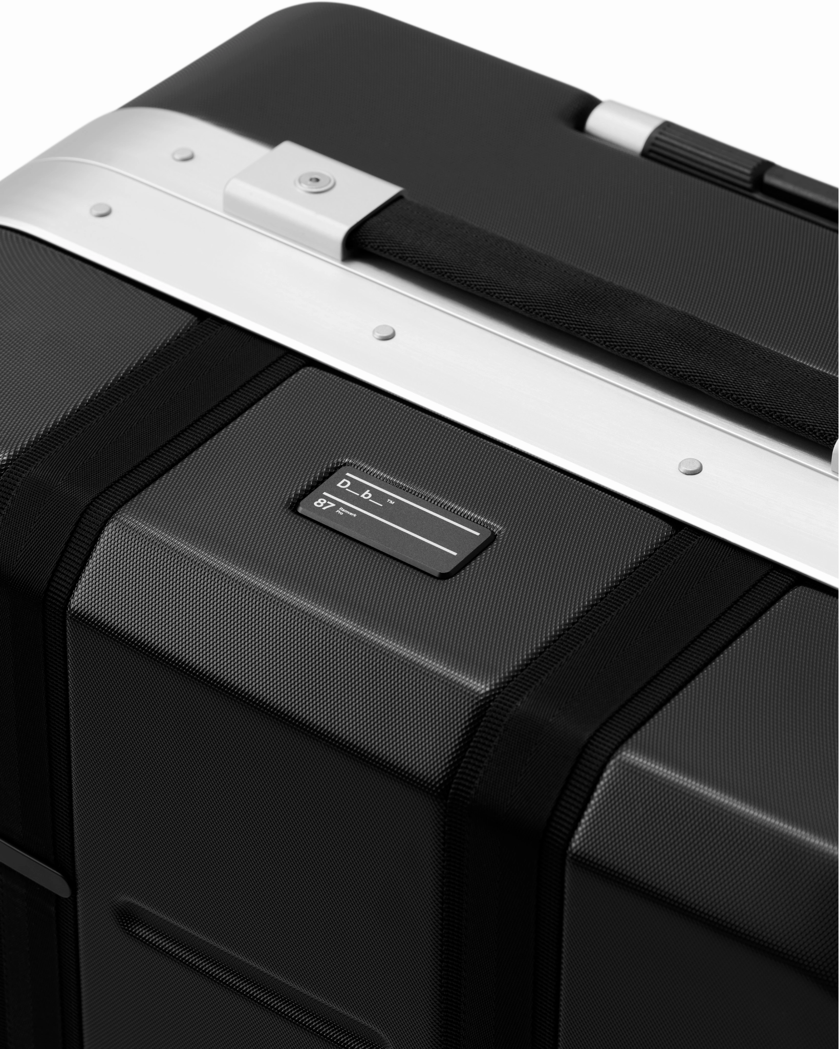 D_b_ Ramverk Pro Medium Check In Spinner Luggage