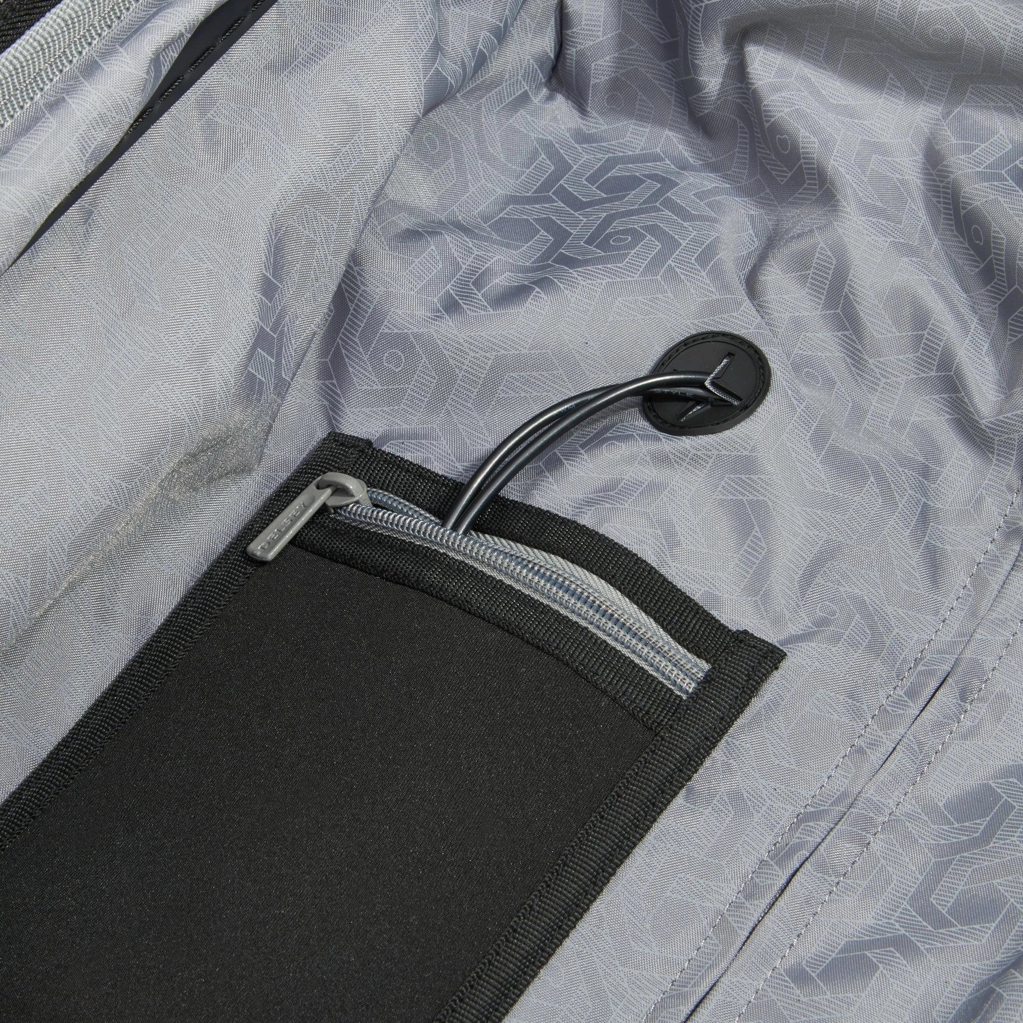DELSEY Paris Chromium Lite 21" 4-Wheel Carry-On Luggage