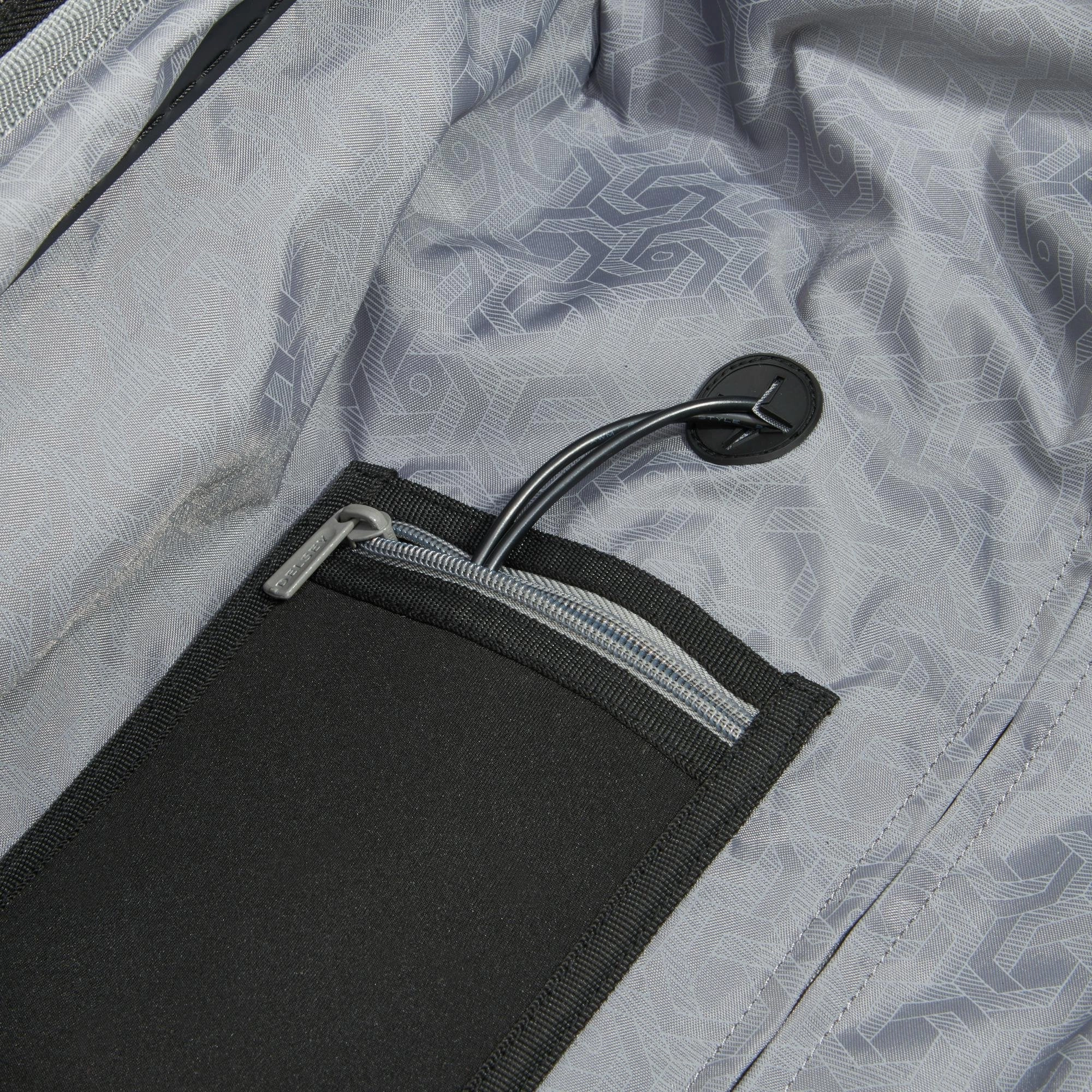 DELSEY Paris Chromium Lite 21" 4-Wheel Carry-On Luggage