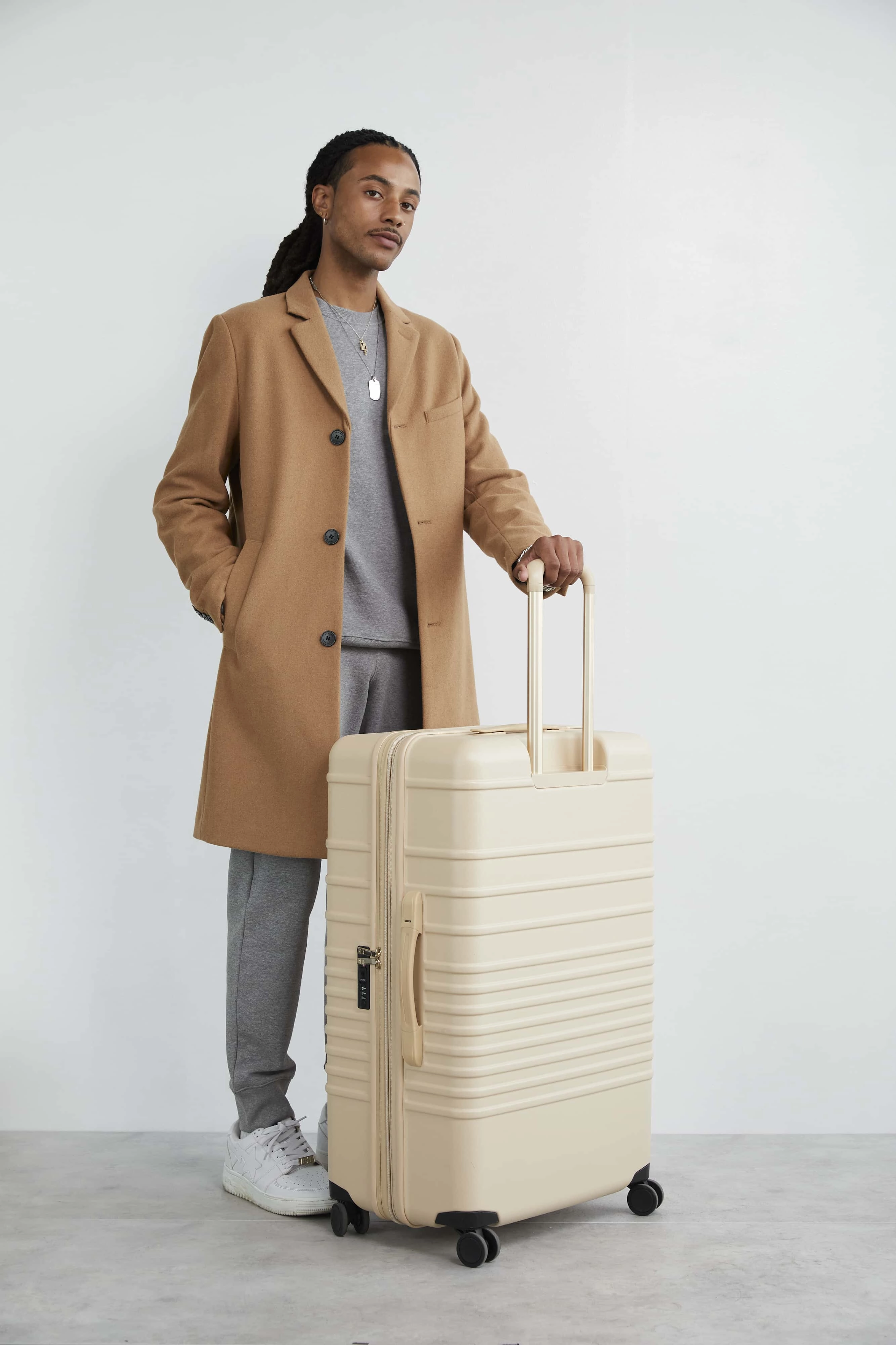 The Large Check-In Roller in Beige