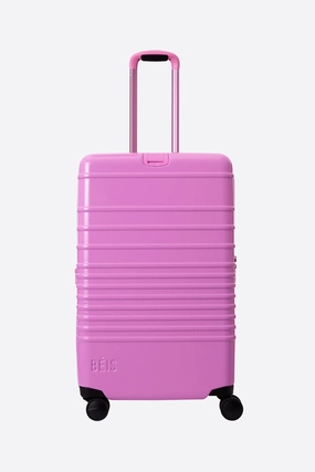 The Medium Check-In Roller in Glossy Berry