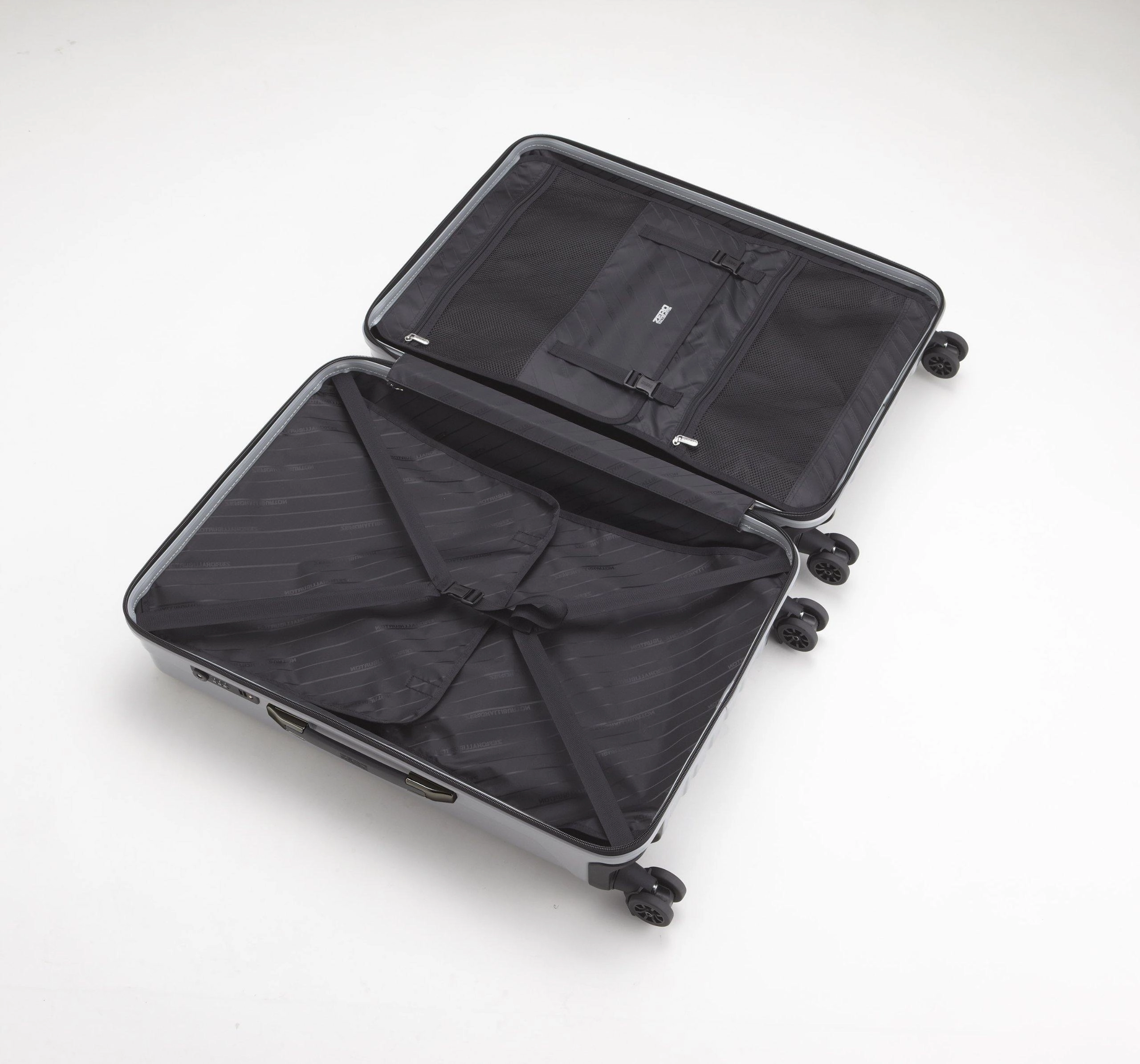 ZERO Halliburton Geo Polycarbonate 24" 4-Wheel Medium Luggage